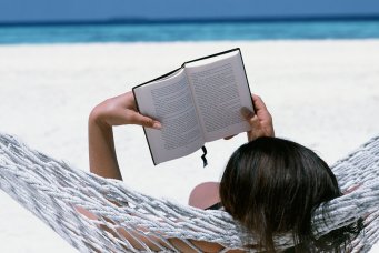 Woman in Hammock with Book